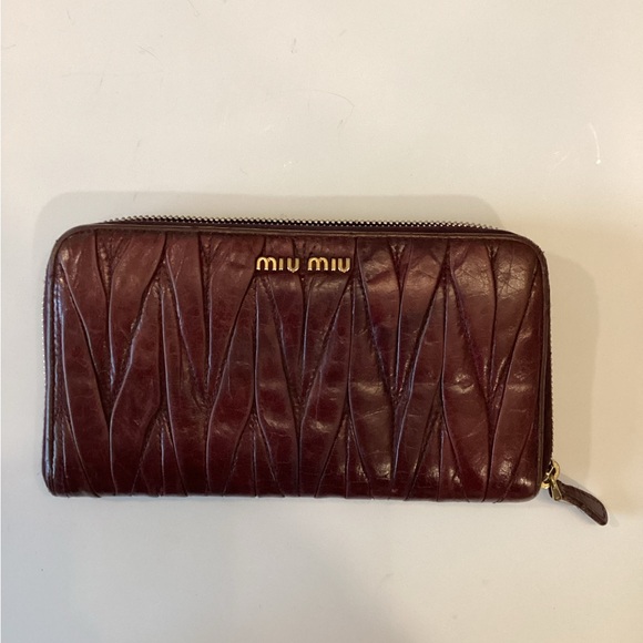 Miu Miu Handbags - Miu Miu gather leather zip around wallet